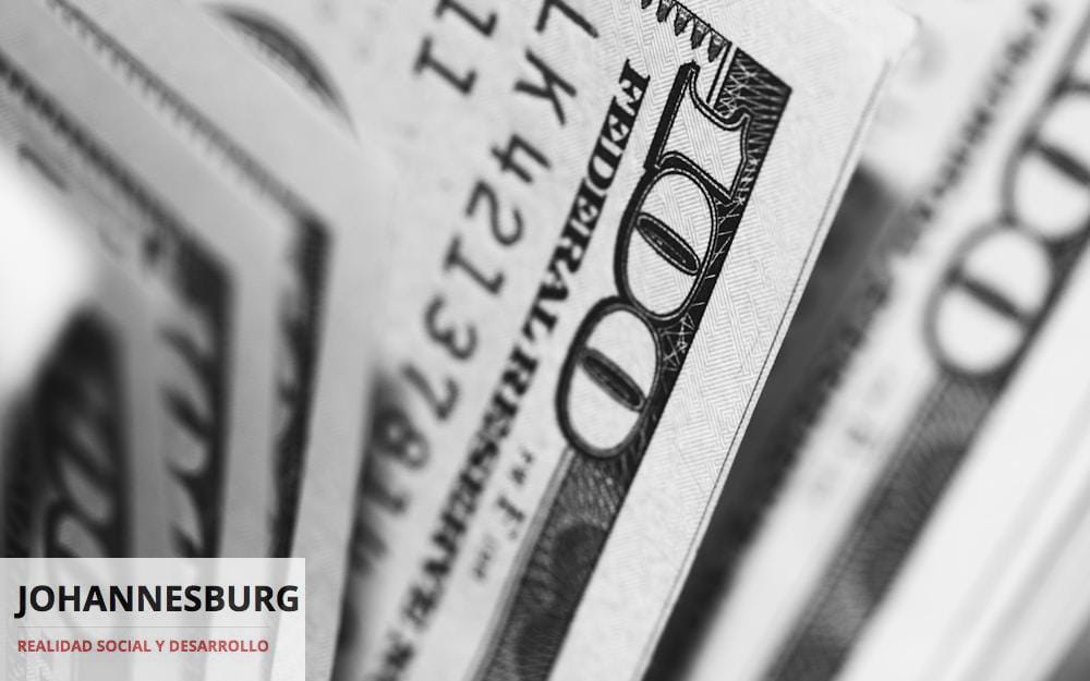 closeup photo of 100 US dollar banknotes
