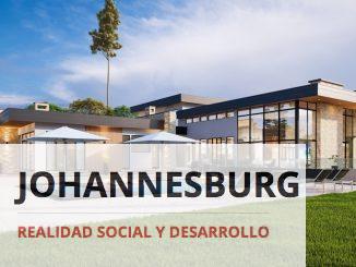 a modern house with a pool and lounge chairs